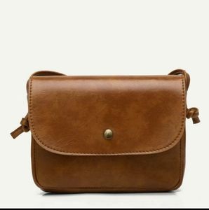 Minimalist flap crossbody bag